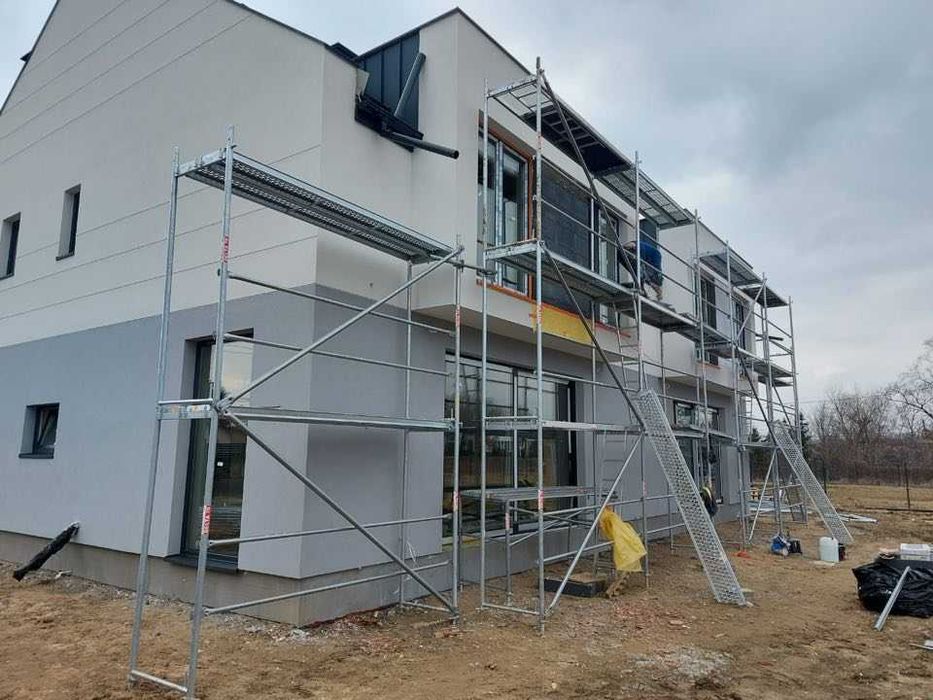 Elewacje Docieplenia Obróbki blacharskie Dachy płaskie Sztukateria VAT