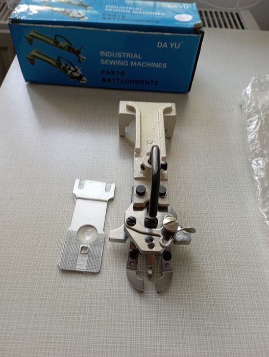 Лапка до пришивання гудзиків