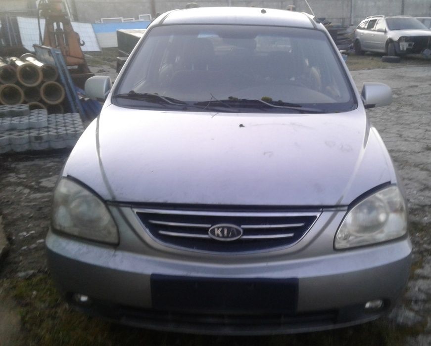 KIA Carens II 2 2004r 2.0 CRDi Przód Lampa Lewa Pas Belka Chłodnice