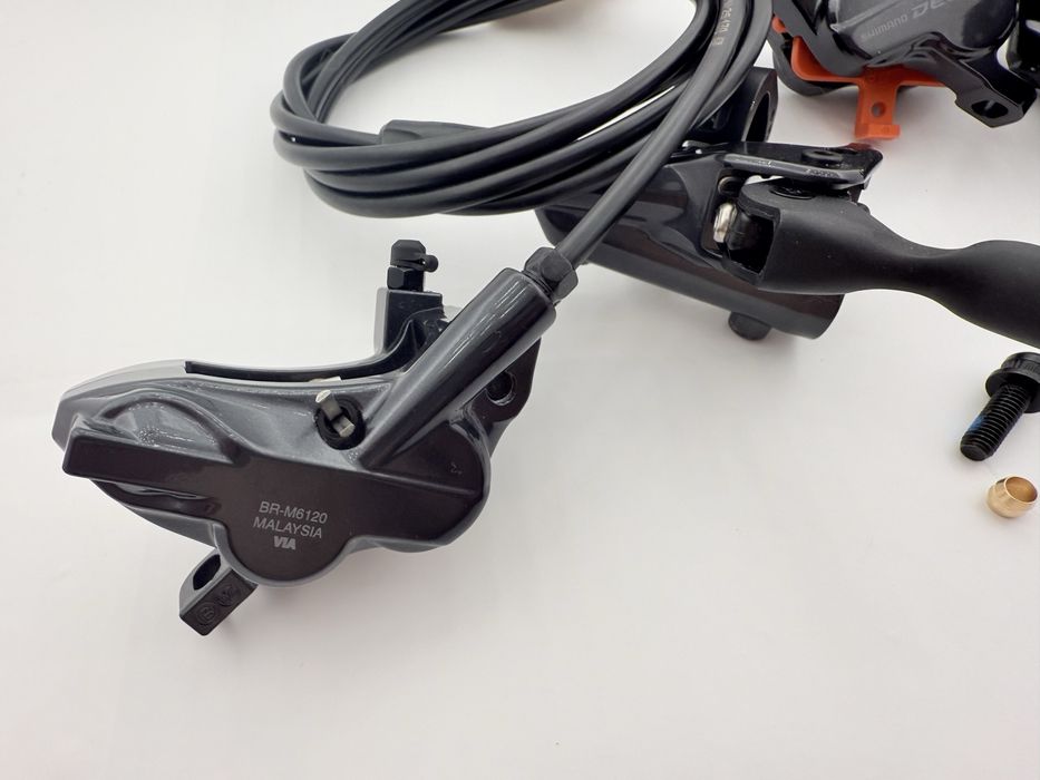 Нові гідравліні гальма Shimano Deore M6120 4 поршеві