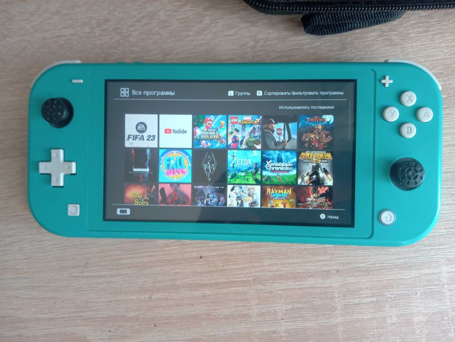 Нинтендо свич лайт + аксесуари + картридж 23 фіфа + акаунт 20+ игор