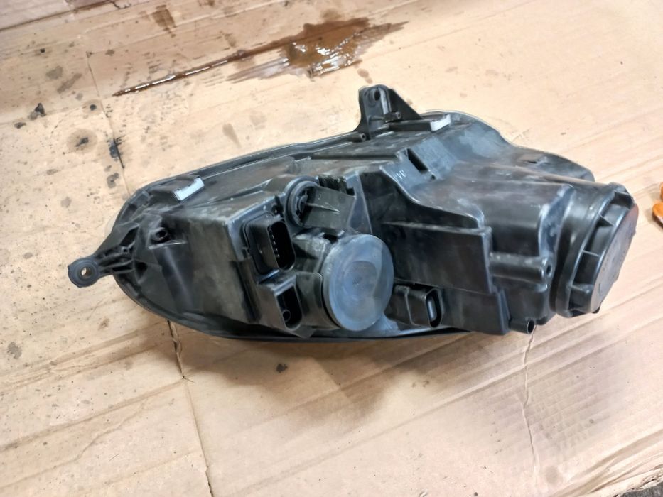 Lampa lewa przód przednia vw golf 5 V jetta