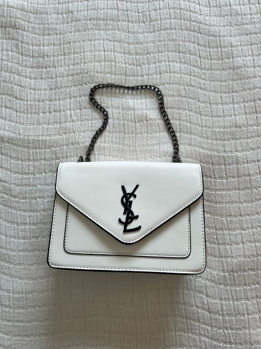 Mochila ysl mulher