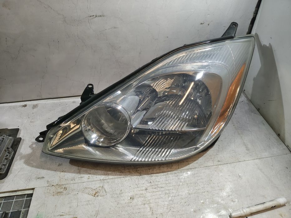 Lampa lewa lewy przód Toyota Sienna 1 Stanley