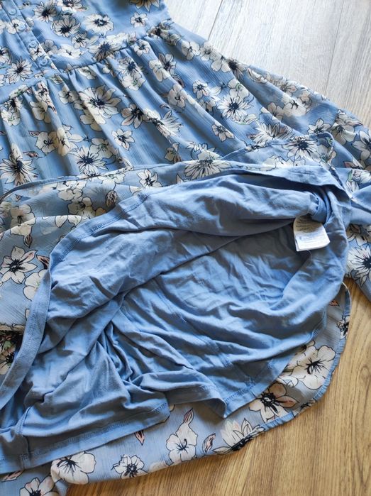 Damska błękitna sukienka w kwiaty falbany r 38 M