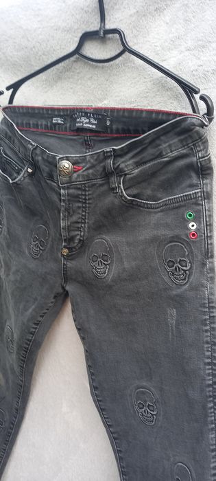 Джинси чорного, блакитного кольору