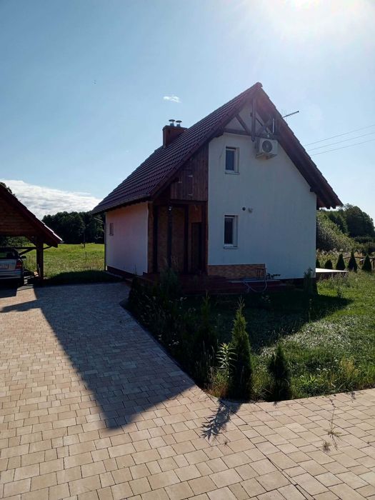 Nowoczesny, energooszczędny dom jednorodzinny z dużą działką i stawem