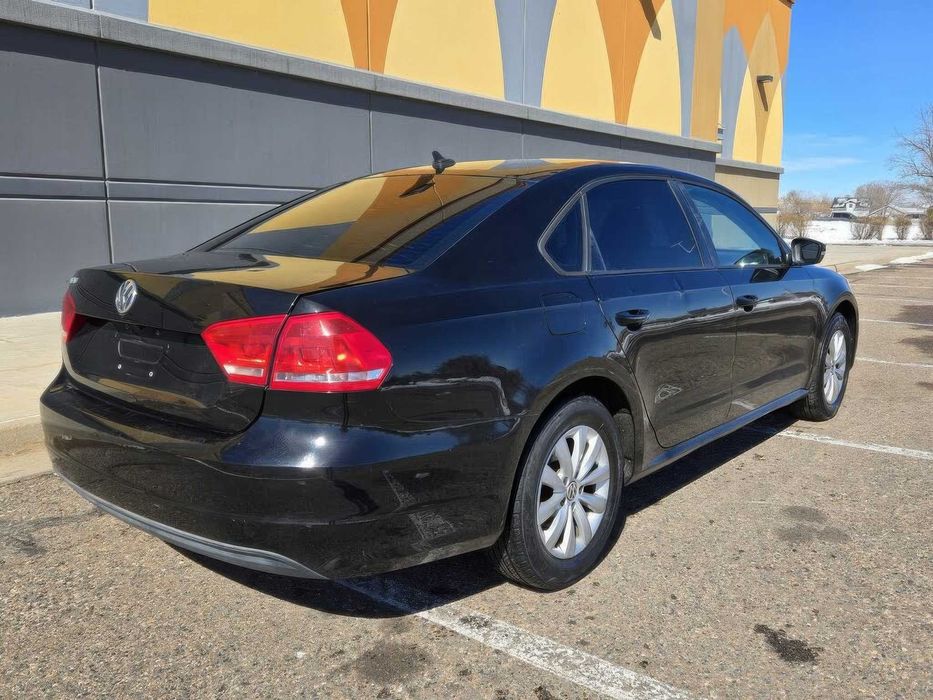 Volkswagen Passat Wolfsburg Edition      2014
