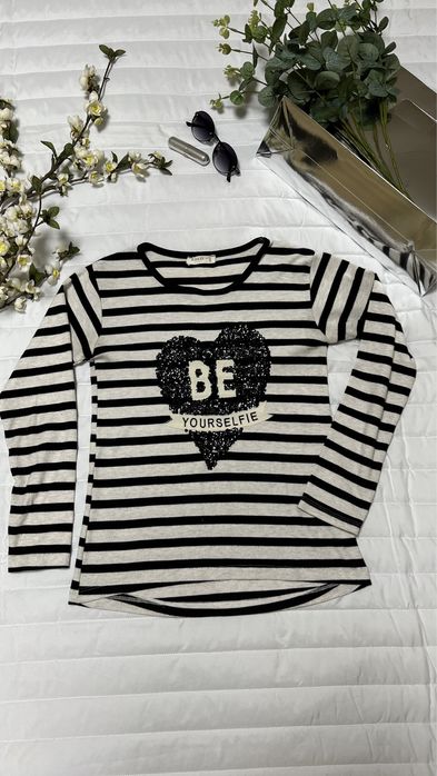 Лонгслів у смужку для дівчинки