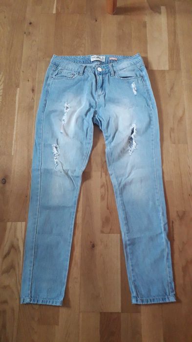 spodnie jeansowe z dziurami House  38