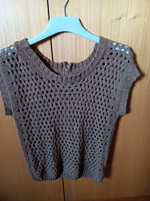 Blusa com fecho malha