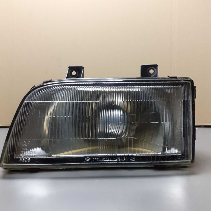 Lampa przednia Kia Sportage I lewa