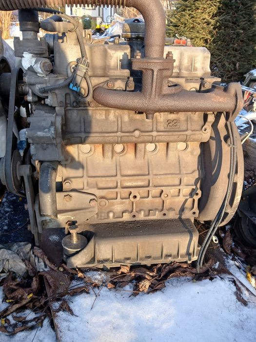 Silnik Kubota 4 cylindrowy