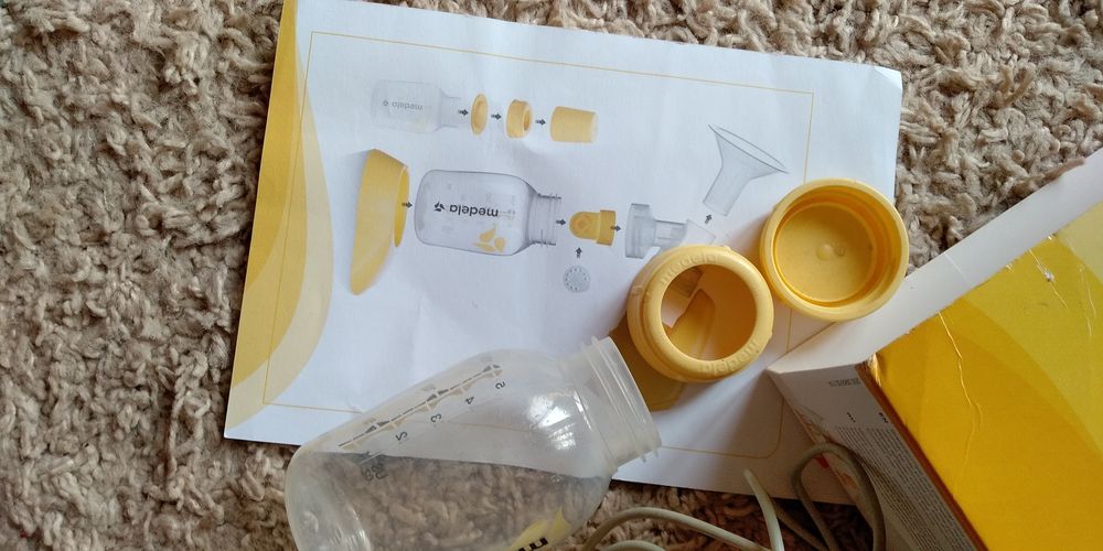 Молокоотсос MEDELA электрический