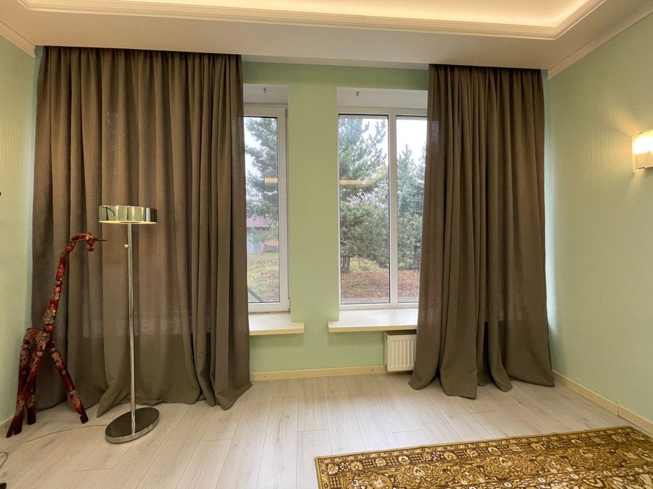 Будинок з ремонтом  на ділянці 18 соток в центральній частині Бучі