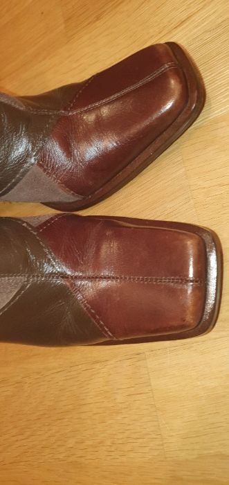 Botas em pele de alta qualidade