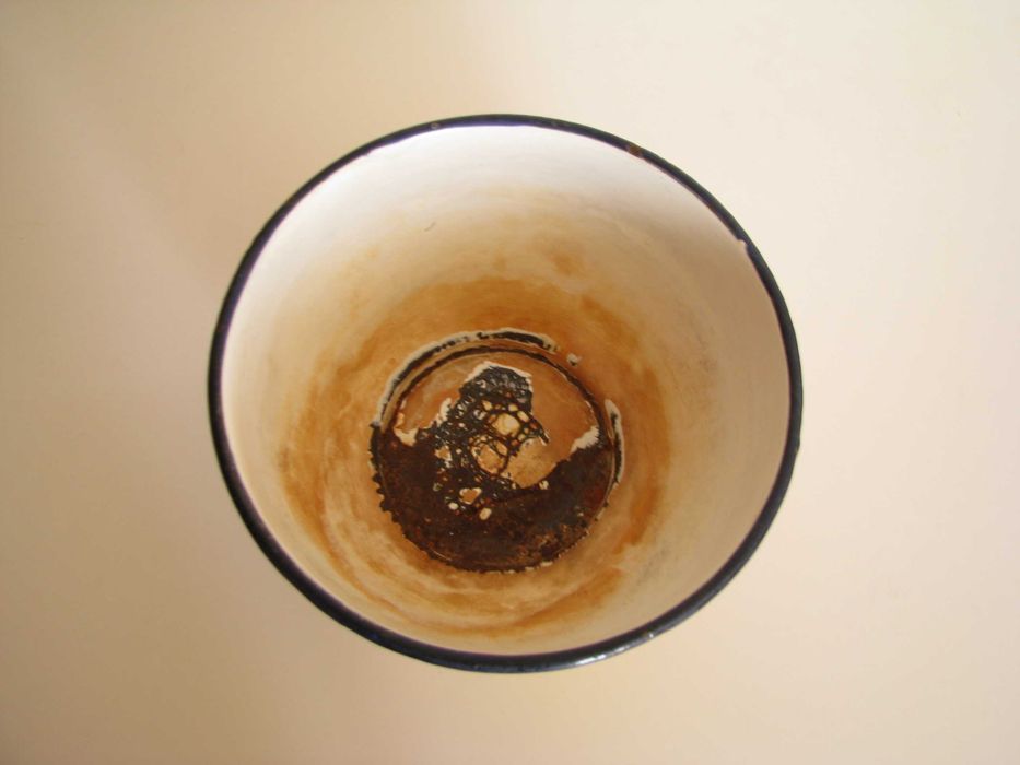 Piękna, stara, metalowa, emaliowana na żółto miska we wzory