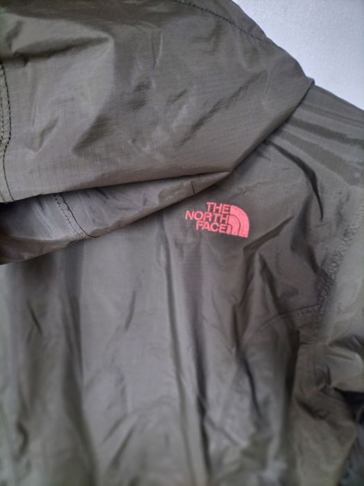 The North Face oliwkowa kurtka, wiatrówka z kapturem