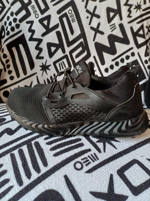 Ténis biqueira de aço