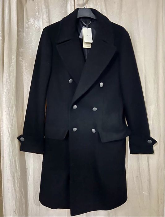 Sobretudo mango novo