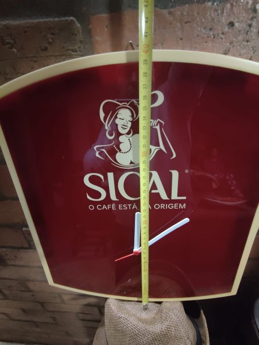 Letreiro relógio SICAL