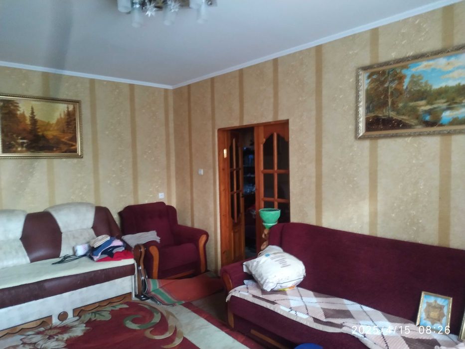 Продам 1/2 житлового будиноку.