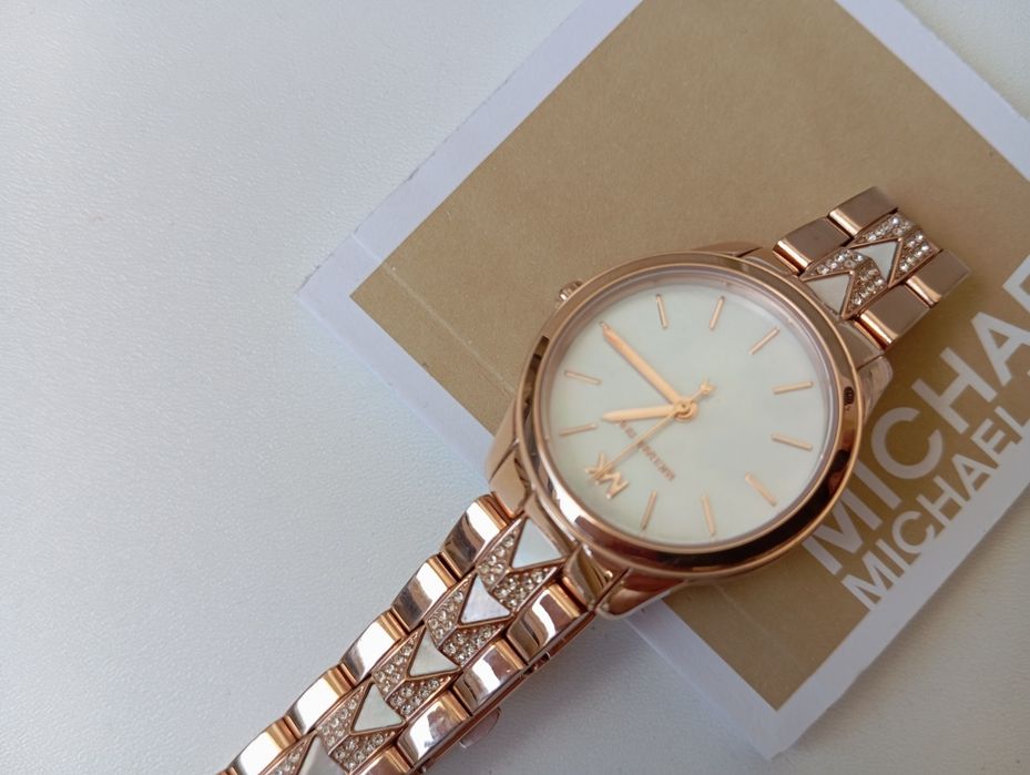 Nowy damski zegarek Michael Kors model 6674
Różowe złoto