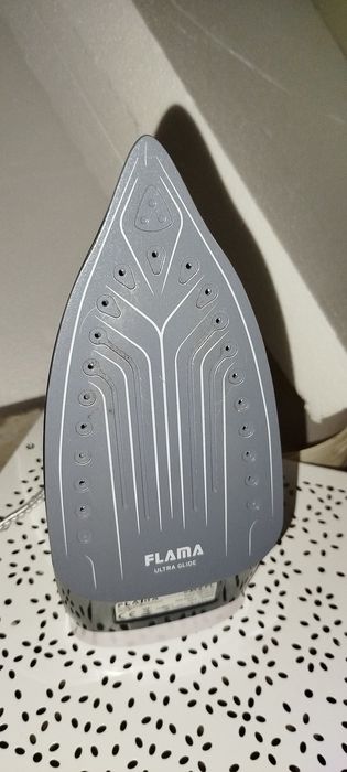 Ferro e tábua de passar