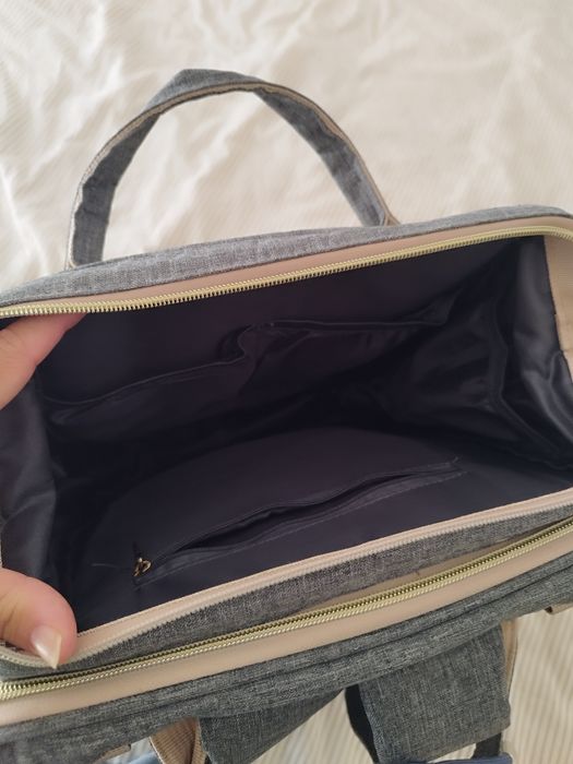 Mochila maternidade e berço portátil