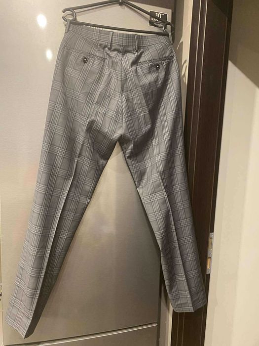 REMUS UOMO nowe eleganckie spodnie męskie 70% wełna