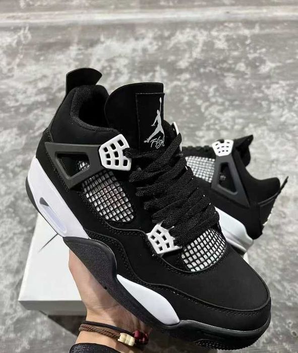 Jordan 4 Retro White Thunder R.40