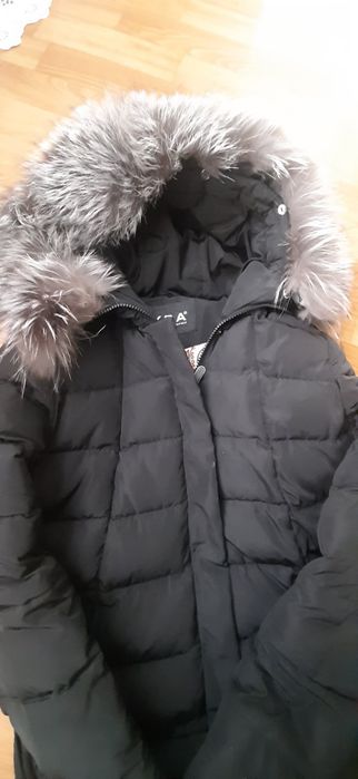 Продам женский  пуховик