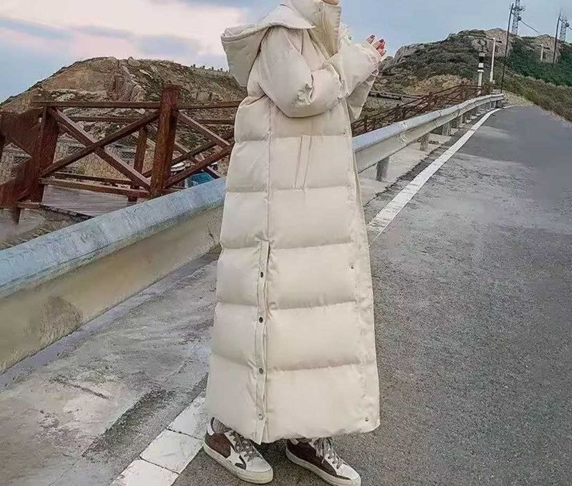 Пуховик об'ємний довгий