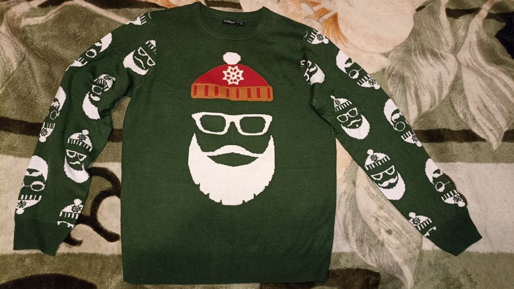 Темно-зелений светр