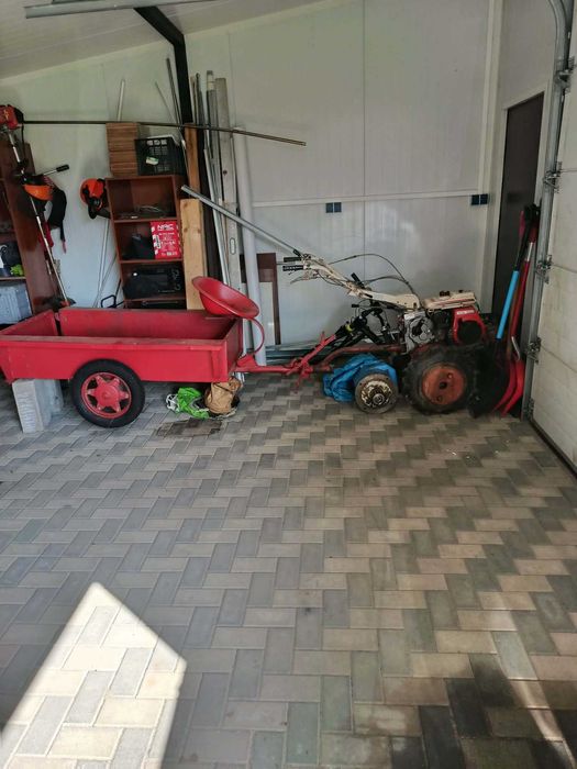 Traktor/dzik Kubota z przyczepką