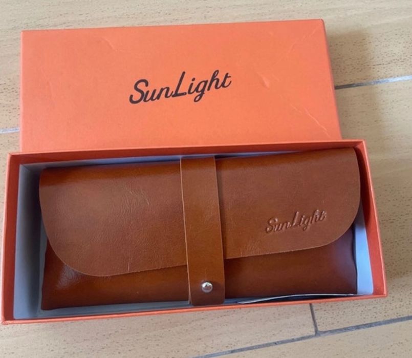 Óculos de sol claro com bolsa de couro