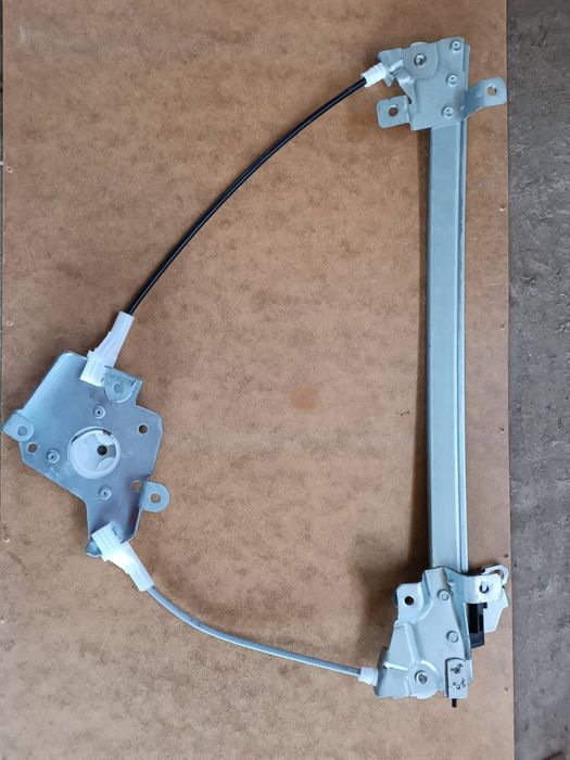 Продам лівий стіклопідіймач авто нексія,стан ідеальн