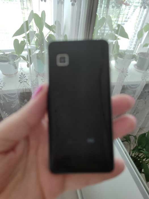 Телефон самсунг.