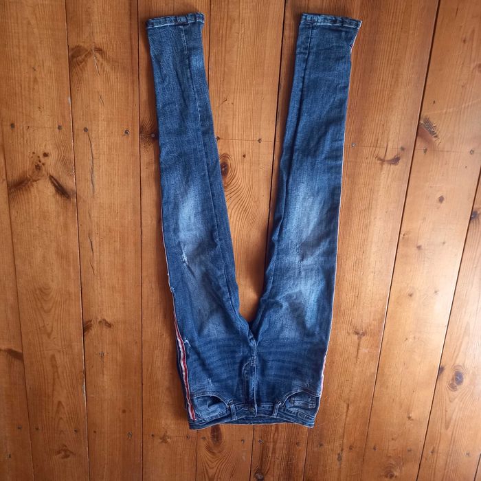 spodnie jeans z lampasami 38 M