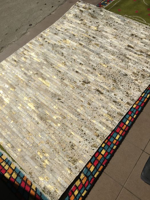 Nowy skorzany dywan 140x200