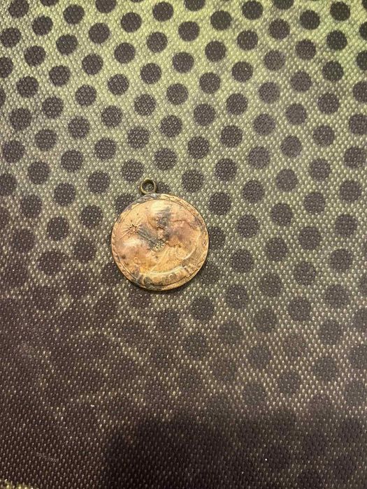 Медаль материнства.