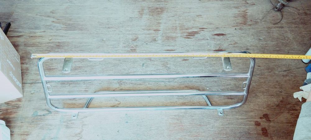 Suporte/grelha para mala