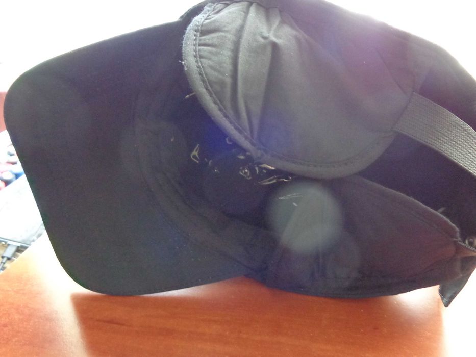 czapka czarna nowa z nausznikami 57 - 58cm, z delikatna ozdobą