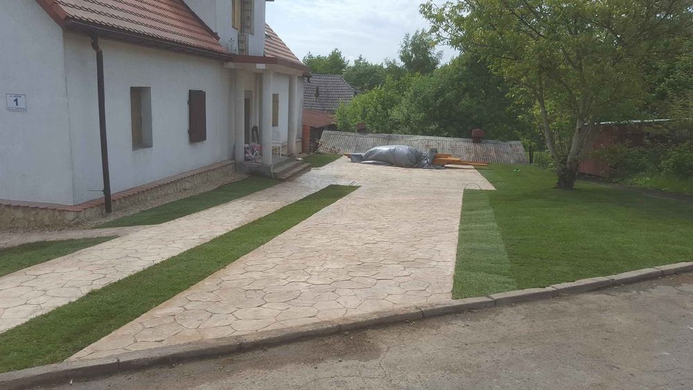 Ogrody, niwelacja terenu, trawa z rolki, glebogryzarka separacyjna