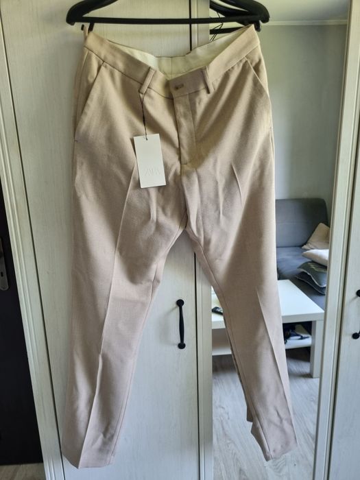 Eleganckie spodnie męskie beżowe Zara r. 40 – nowe