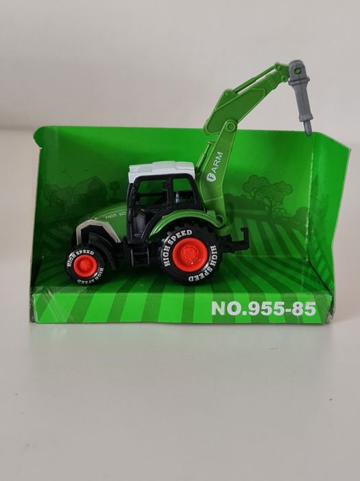 2 zabawkowe modele traktorów z akcesoriami