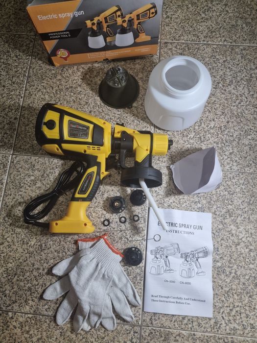 pistola de pintura elétrica HVLP amarela, com potência que varia entre 650W e 850W.