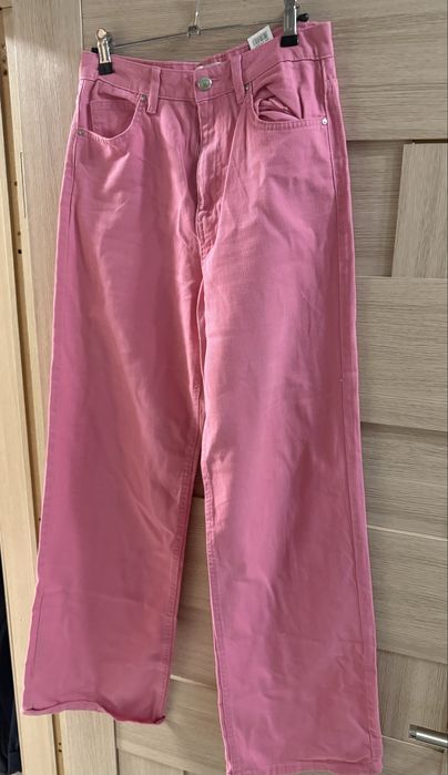 рожеві джинси кльош на розмір xs-s