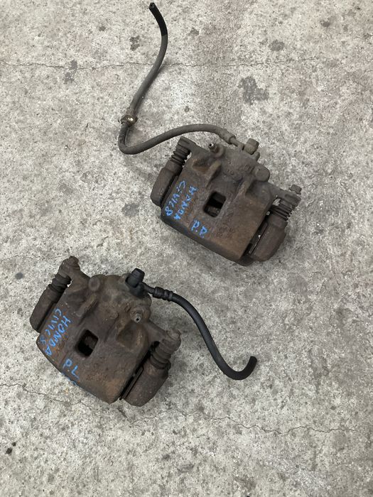 Honda Civic VIII 8 - hybrid - zacisk przód lewy prawy