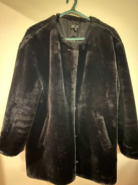 Casaco de pelo preto